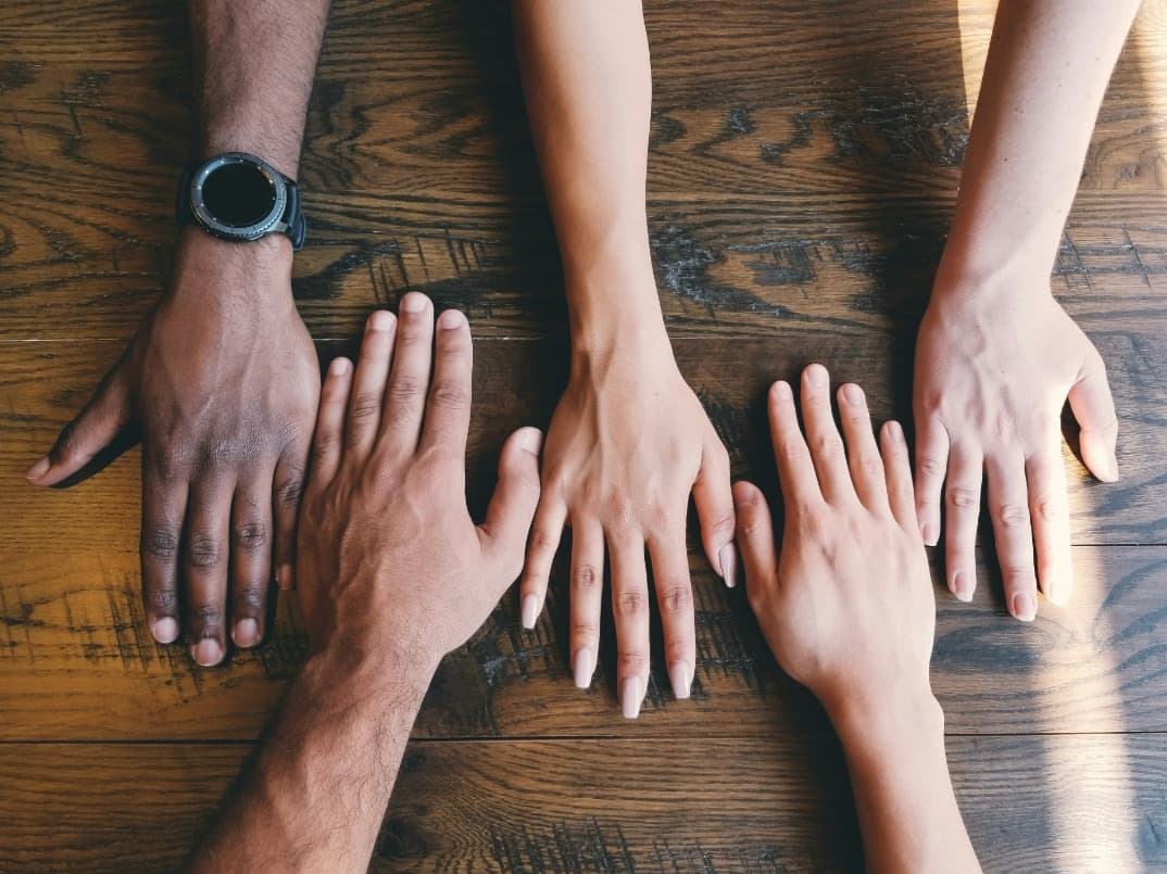 img of hands coming together